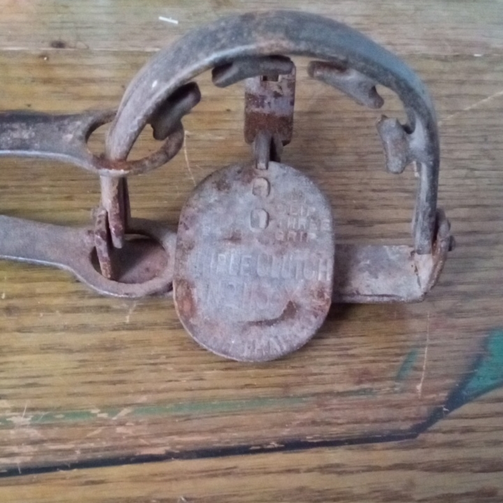 Antique brown metal trap decor